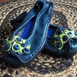 Blue leather slip ons